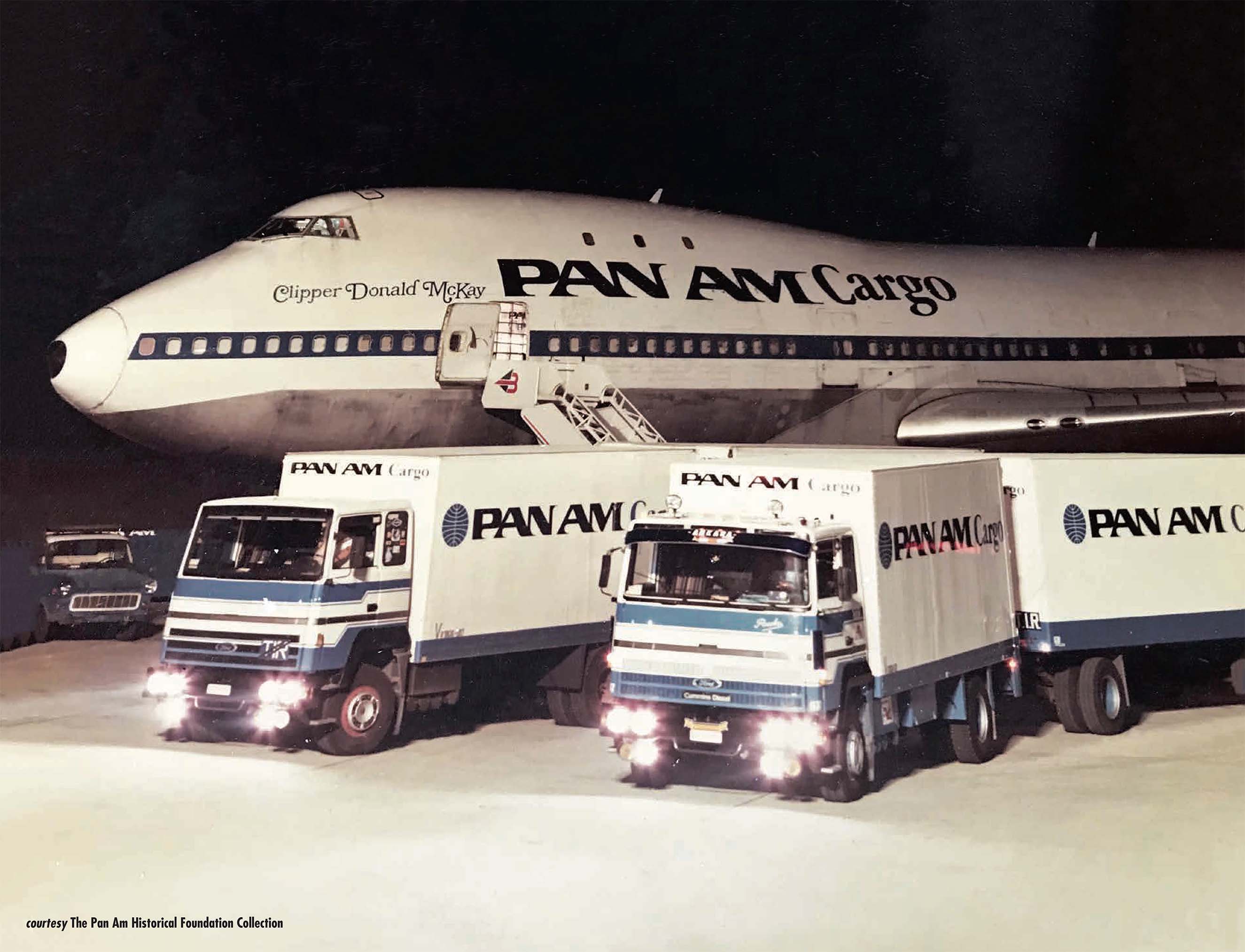 Pan Am 747 Cargo plane with Pan Am trucks (Pete Runnette/Pan Am Historical Foundation Collection).