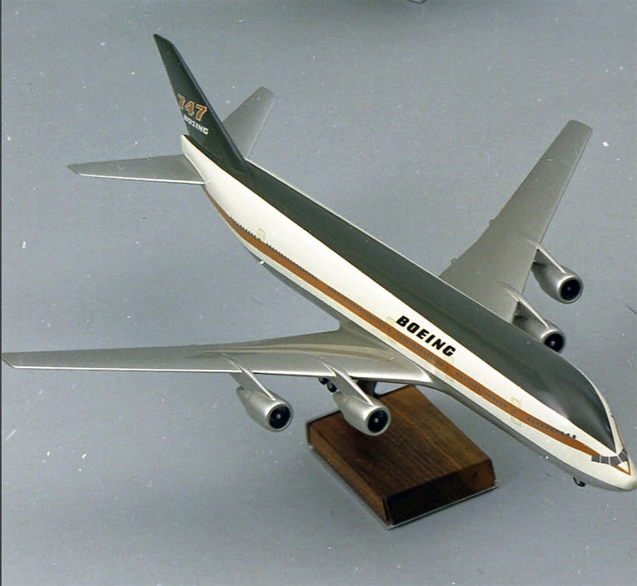 4. "Boeing"-747 Model without double deck design. Livery: white and black with red stripes. (Courtesy, Boeing Company Archive).
