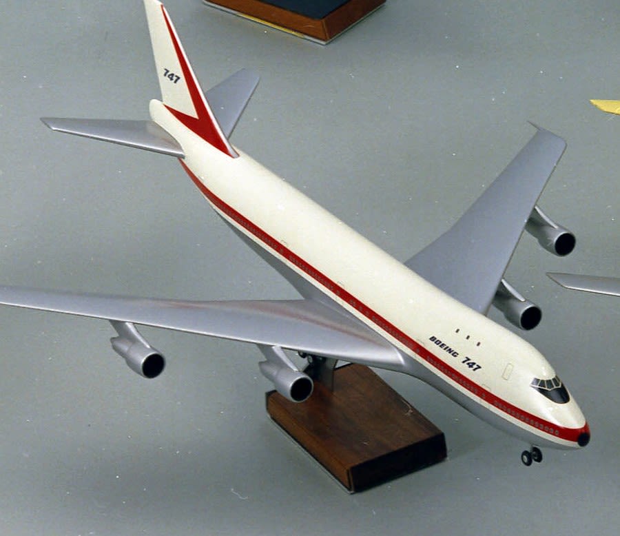 5. "Boeing 747" with hump & larger tail and wings. Livery of Boeing prototype: white with red stripes (Courtesy, Boeing Company Archive). Courtesy, Boeing Company). 