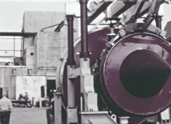 Film Frame: Moving an engine to the factory (Pan Am Historical Foundation Film Collection).