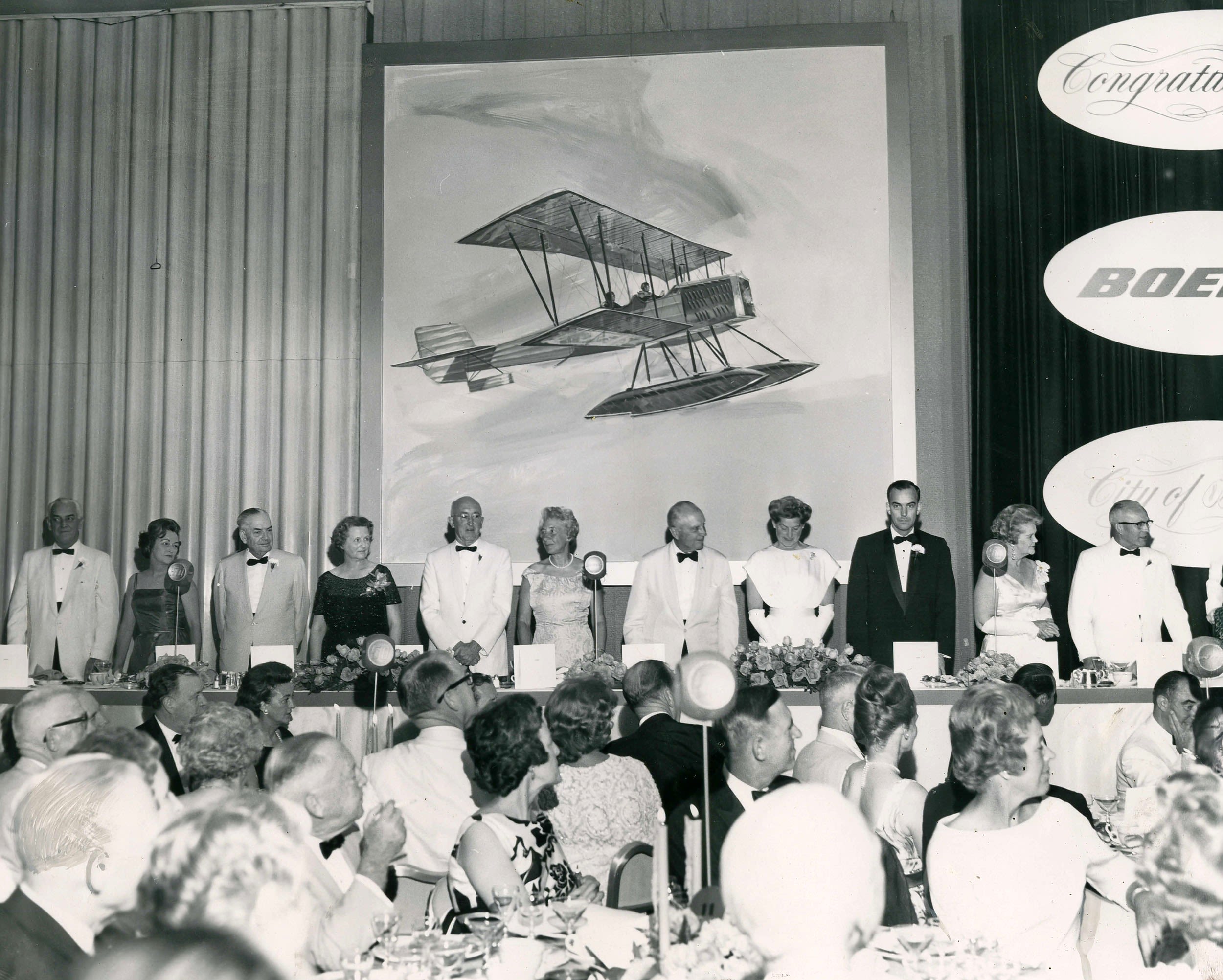Bill Allen (5th from left) and Juan Trippe (5th from right) at the Boeing banquet. From "William McPherson Allen (The Boeing Company), Boeing's 50th AnBill Allen (5th from left), Juan Trippe (5th from right) and Mrs. Betty Trippe (center) at the Boeing banquet. From "William McPherson Allen (The Boeing Company), Boeing's 50th Anniversary Banquet, July 16, 1966" (Steven R Shook Collection, Flickr).iversary Banquet, July 16, 1966" (Steven R Shook Collection, Flickr).