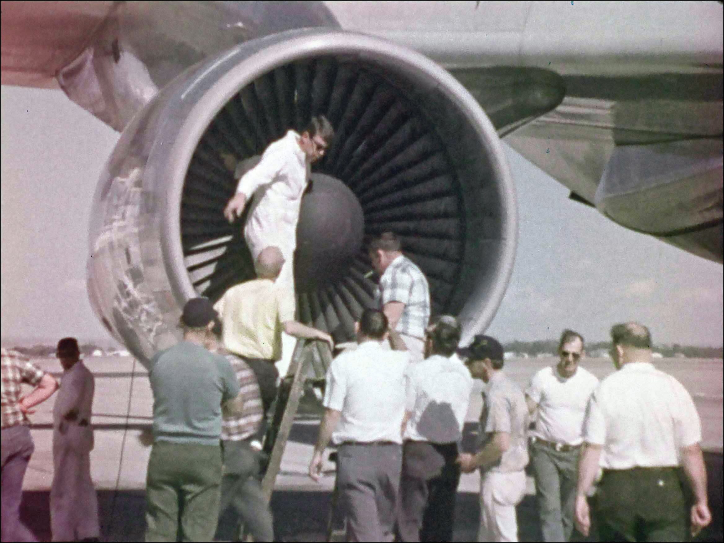 Checking the 747 Engines, film frame from "New Era." PAHF Film Collection.