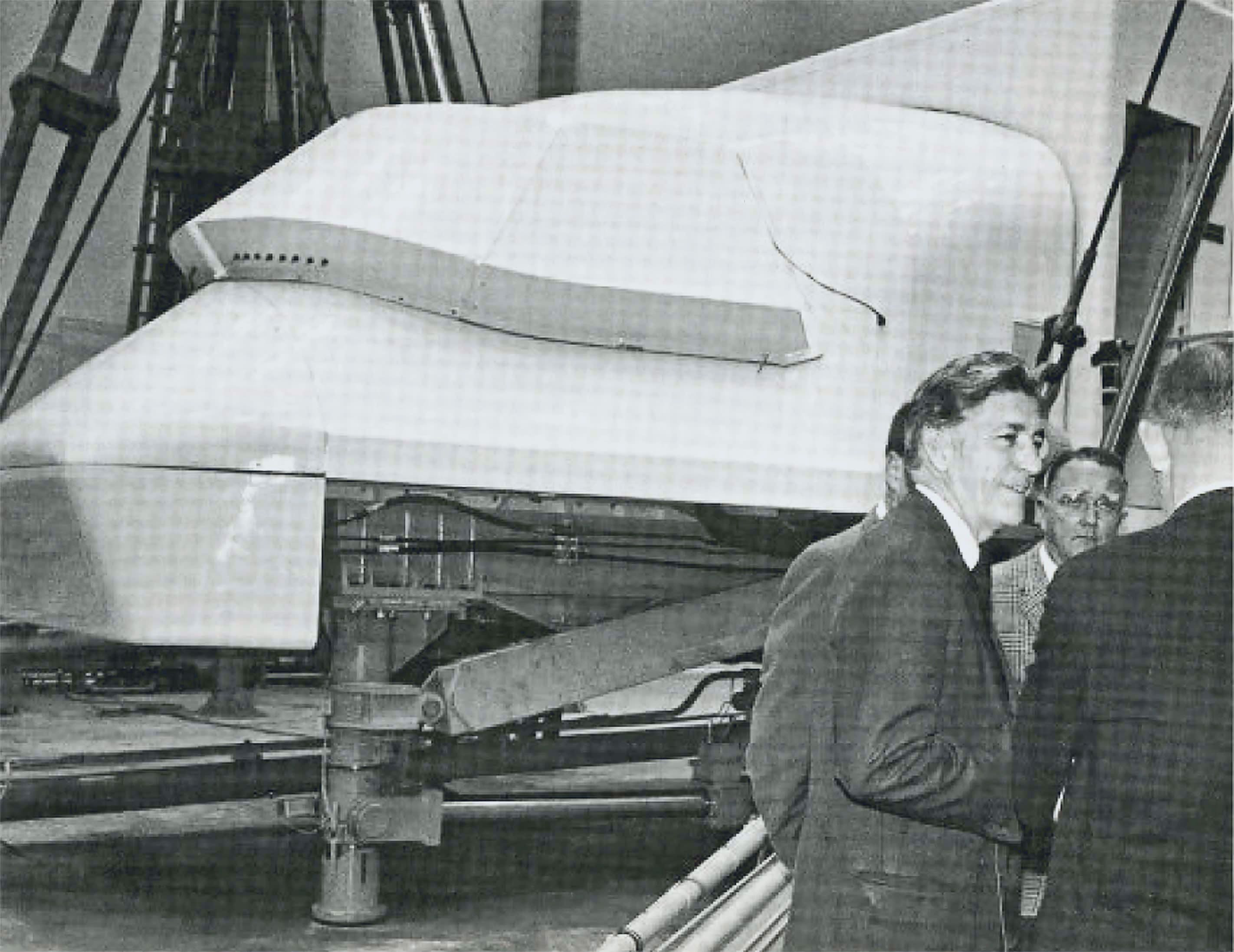 Pan Am President Najeeb Halaby at The Boeing Company on his tour of the 747, standing by the Conductron, Boeing's 747 flight simulator ("Clipper Cockpit," November 1969, p. 7, University of Miami Special Collections).