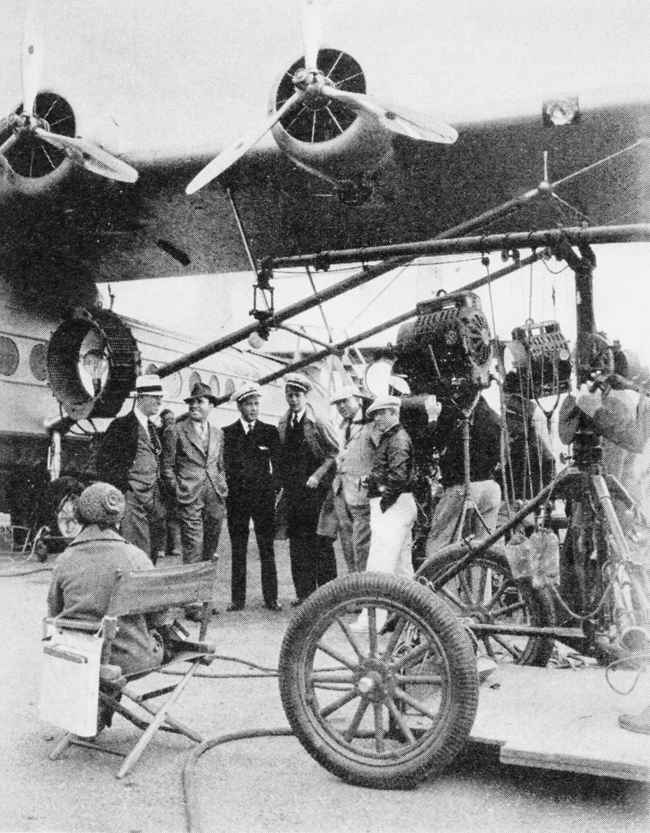 Beside a Pan Am S-42 . Left to right: Pan Am's William Van Dusen-Pan Am Director of Public Relations; Pat O'Brien; Humphrey Bogart; Ross Alexander; Ray Enright-Director of the film; and Charles Edeson-chief photographer ("Pan American Air Ways").