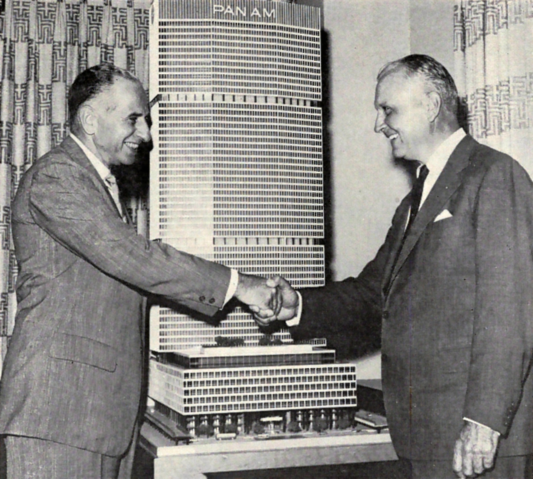 “SEALED WITH A HANDSHAKE… Erwin S. Wolfson, left, president of Grand Central Building, Inc., and President Trippe exchange greetings in front of model of the new Pan Am Building. Clipper, Vol. 8, No. 10, October 1960 (University of Miami Special Collecdtions. Pan American World Airways, Inc. records).