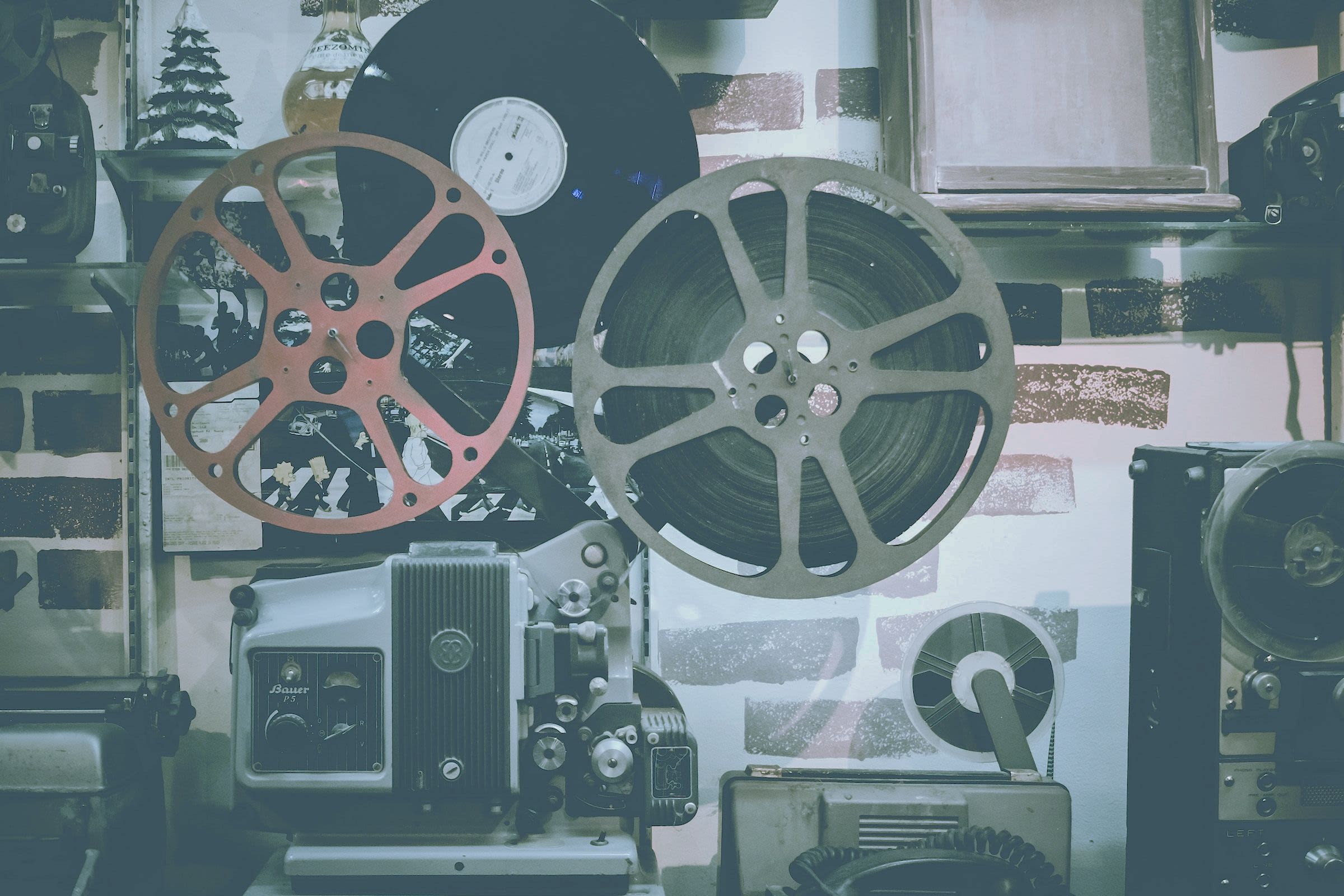 Film Projector and Reels by Noom Peerapong on Unsplash